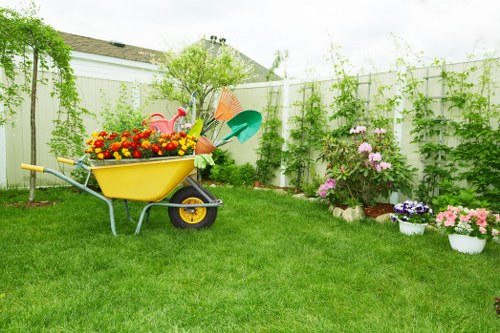 Gardeners Dalston working safely with protective equipment